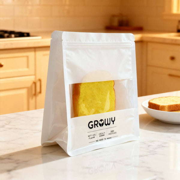 flat bottom bread bag with clear window displaying sliced bread on kitchen counter