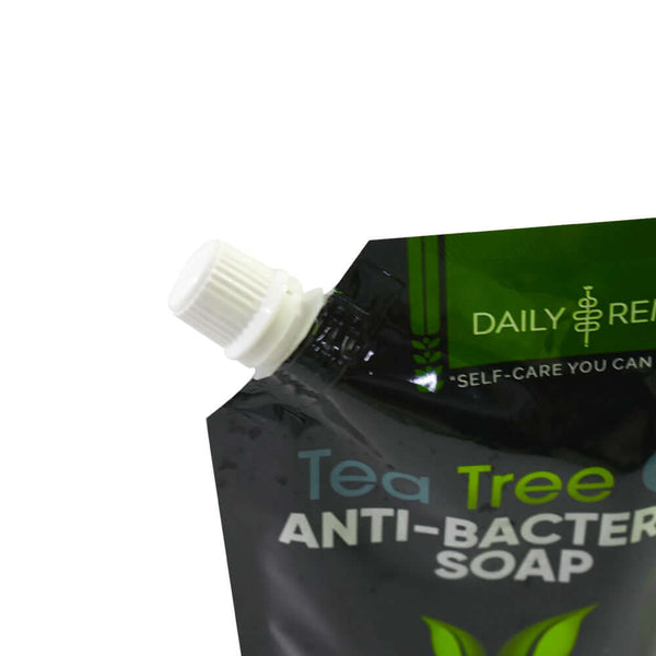 Close up of white screw cap on plastic liquid spout pouch