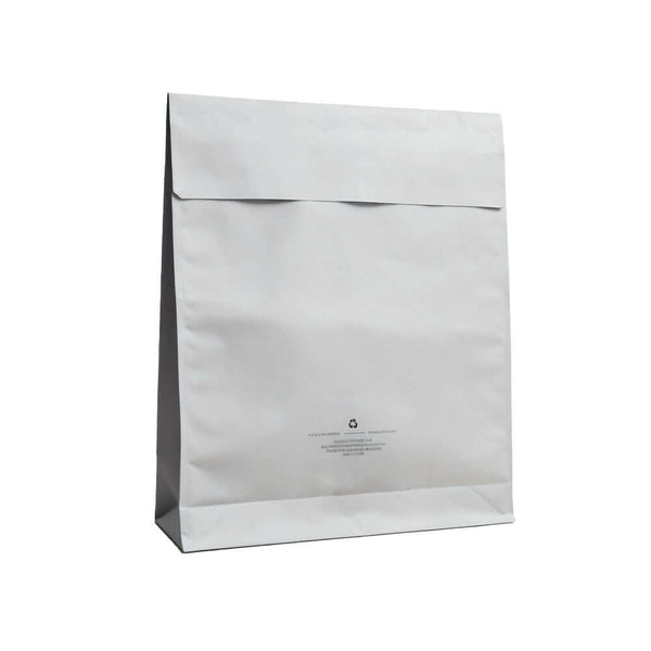Opaque plastic mailing bag with peel and seal closure
