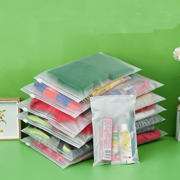 closet storage using frosted garment zipper bags for folded clothes