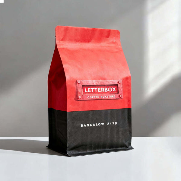 Red and matte black kraft flat bottom coffee bag with square bottom design